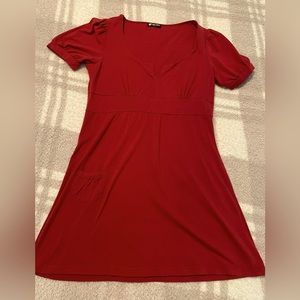 Red v neck tunic with tiny pocket. Size small. EUC